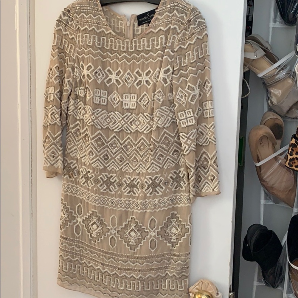 Needle and thread beaded dress